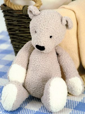 Sirdar 1245 Ted the Bear in Sirdar Snuggly Snowflake DK. Uses #3 Weight Yarn.